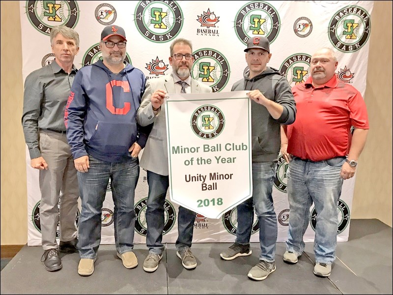 Gerald Duhaime, David Weber, Dan Feser and Rene Feser accept the Sask. Baseball Minor Ball Club of the Year Award. Photos submitted by Sherri Solomko
