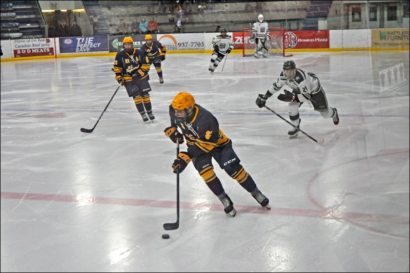 This is action from Saturday night at the Civic Centre where the Battlefords AAA Stars were in action against Swift Current. The Stars ended up on the short end of a 5-0 final score. Photos by John Cairns