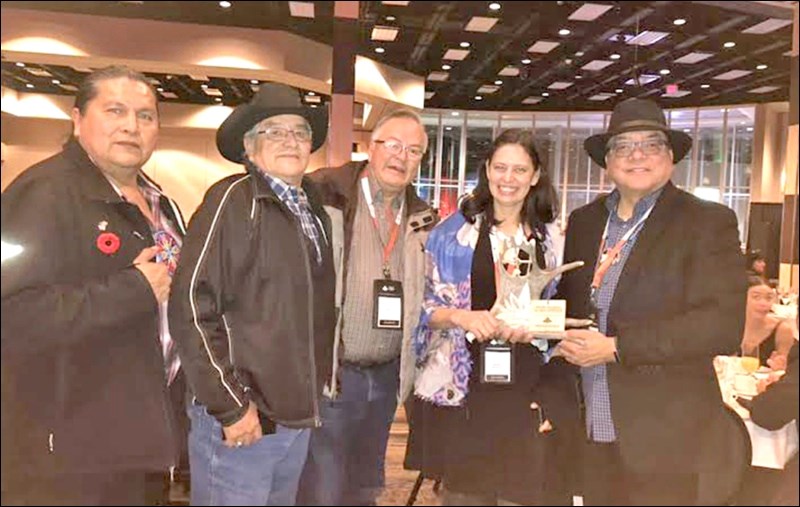 Chief Poundmaker Museum recently took home an award from the International Indigenous Tourism Conference in Saskatoon in recognition of the museum's indoor programming. Pictured are Alvin Baptiste, delegate; Eric Tootoosis, elder advisor at the Chief Poundmaker Museum; Brian Tootoosis, Parks Canada liaison; Andrea Bacheski, Parks Canada district superintendent; and Councillor Milton Tootoosis. Photo submitted