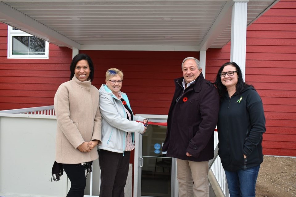 A ribbon-cutting ceremony was held on Friday at the River Valley Dental Clinic which opened its doors in Kamsack on October 9. From left, were: Valerie Ritchie, building owner; Mayor Nancy Brunt; Terry Dennis, Canora-Pelly MLA, and Mandi Kuculym, regional manager for group practices in Saskatchewan.