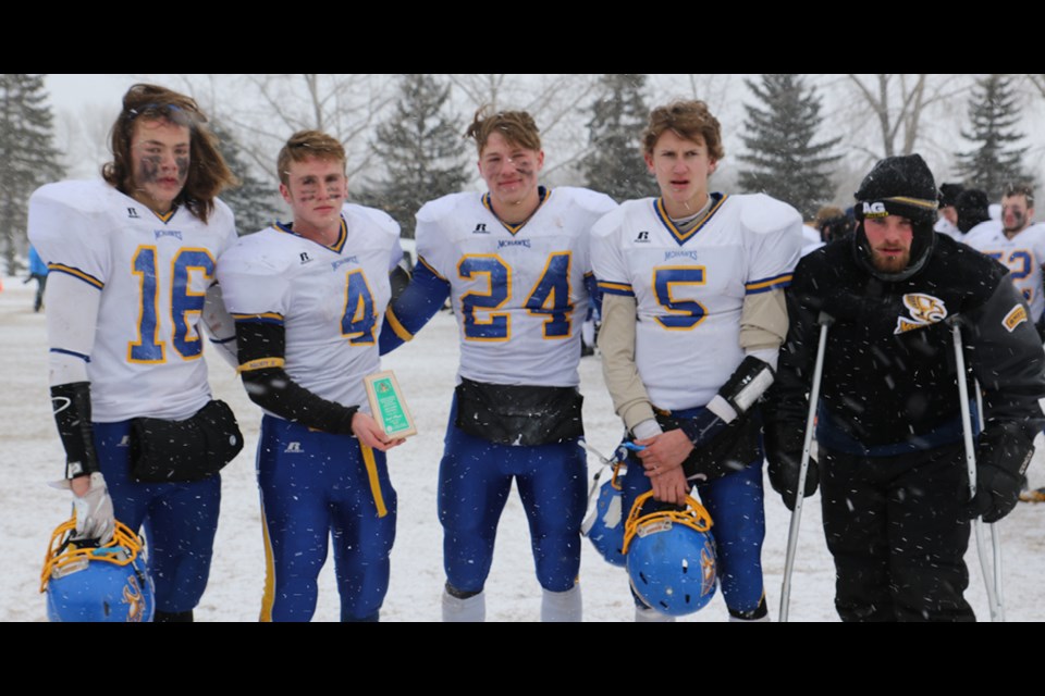 The Humboldt Mohawks high school football team won a silver medal in the provincial championship after a game at Glenn Hall Park Nov. 10. From left are Dawson Herring, Bray Berschiminsky, Rylan Eckl, Carter Tarnowski and Ryley Amendt. Photo by Devan C. Tasa