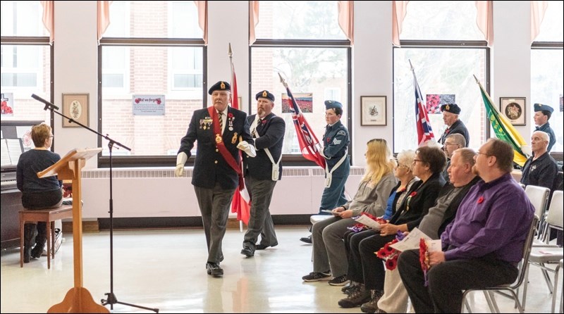 The Colour Guard arrives.