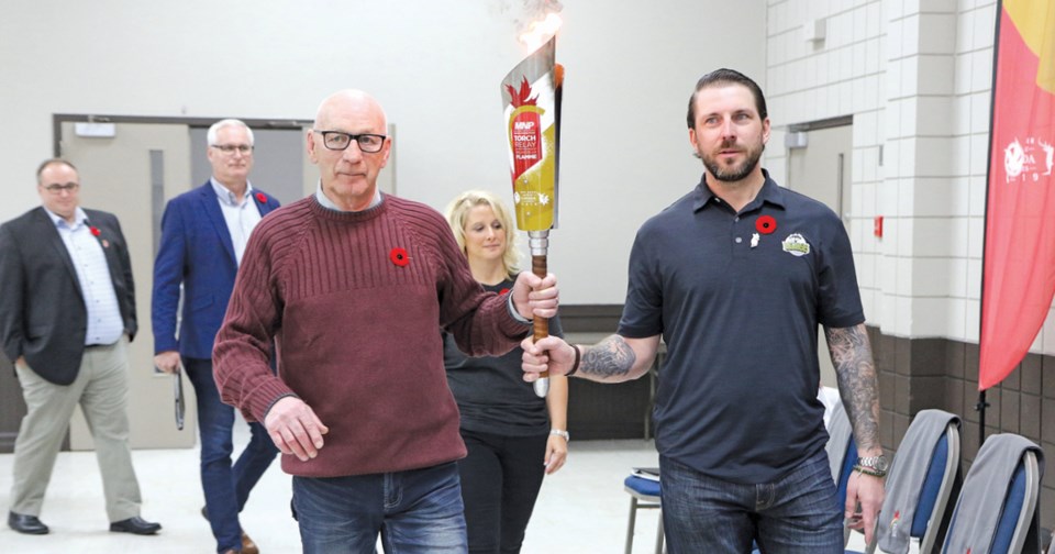 Roly McLenahan Canada Games Torch