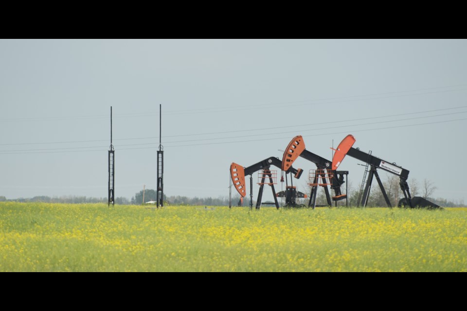 On the left are two IJACK UNO units, hydraulic pumpjacks that are gaining substantial market share in the oilfields around Cromer, Manitoba.