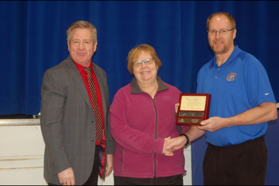 Terry Zawislak, who has been an administrative assistant for 39 years at the Sturgis Composite School was recognized with a Sea Star award. From left, were: Mark Forsyth, Superintendent of Good Spirit School Division; Zawislak and Brad Cameron, principal.