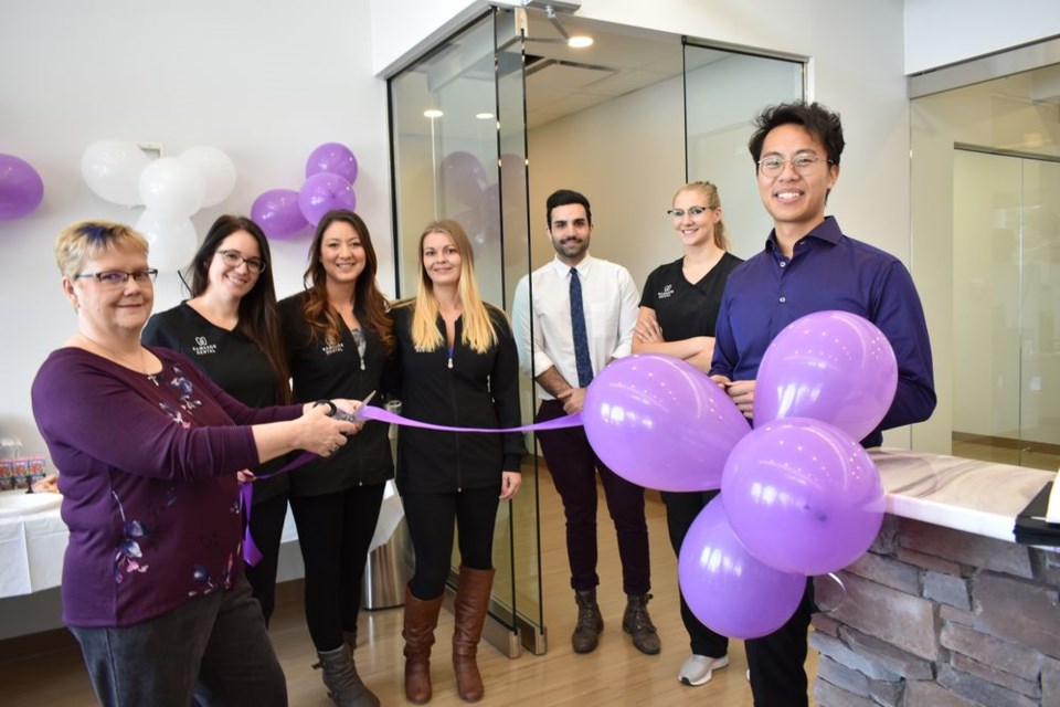 Dr. Michael Mah, dentist and president of Kamsack Dental, greeted the crowd on November 21 before the ribbon was cut to officially open the clinic on November 21. From left, were: Nancy Brunt, Kamsack’s mayor; Shandie Leis, office manager; Carleigh Sugawara, reception; Dana Csaba, reception; Dr. Bardia Ghassemi, dentist and managing partner; Bobbi Rauckman, dental assistant, and Mah.