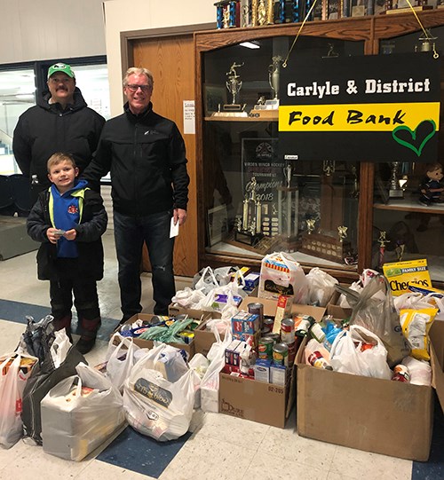 This shows the food brought in at the Cougars’ Give Back to the Community Night held Nov. 30. All food was donated the district food bank.