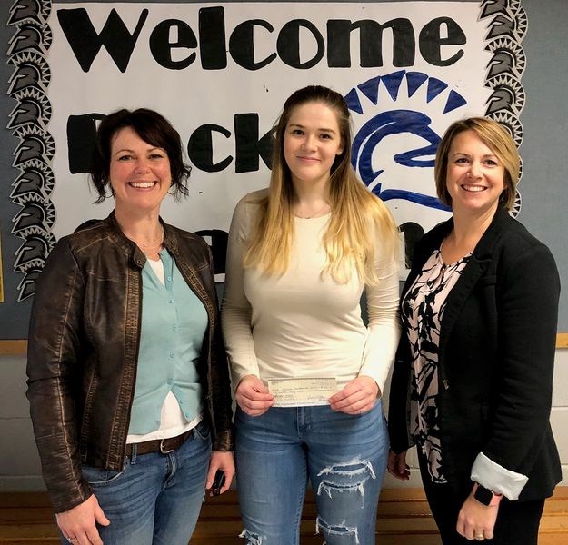 Nicole Korpusik, left, and Reagan Foster, right, made a donation of $649 to Julianna Raabel, president of the Kamsack Comprehensive Institute SRC, on behalf of the FF5 charity run which was held in Stenen earlier this spring.
