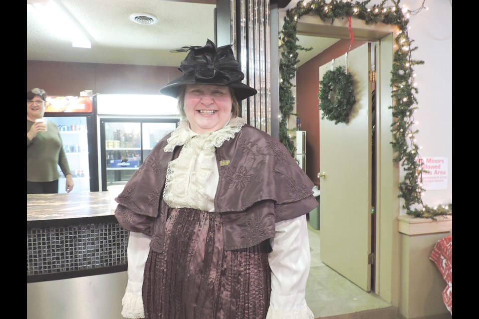 Shelley Slykhuis was dressed in a costume for the Dickens Village Festival in Carlyle. Photo by Joan Blue