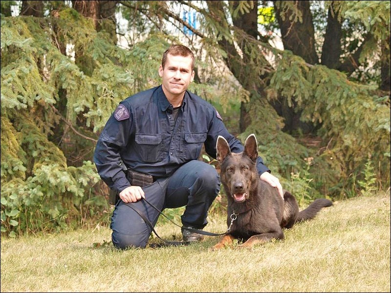 Cpl. Colin Pyne and Police Service Dog Soap of the Battlefords RCMP.