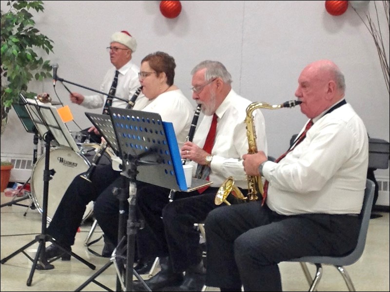 The Meota Hobby Band entertained at St. Joseph’s Calasanctius Church the afternoon of Dec. 14 to a full house of happy people. It was mostly Christmas music and songs. All enjoyed a delicious turkey supper that followed, marking the end to a prefect day. Above are Lawrie Ward, Janet Gunderson, Don Mitchell and Bud Moar. Photos by Lorna Pearson