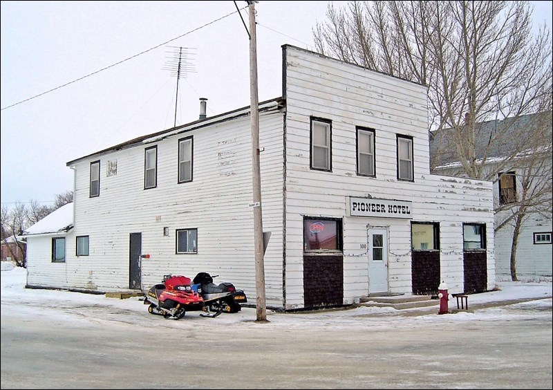 Snowmobilers stop for a brew at the Pioneer Hotel in Wiseton, 2006.