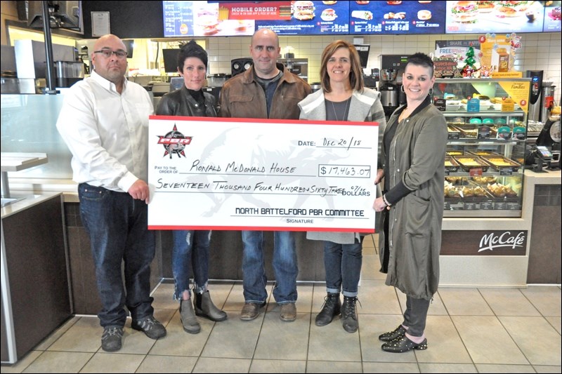 Seen in the presentation to Ronald McDonald House is Dave Taylor representing McDonald’s/Ronald McDonald House, Jodi and Corey Chmelnyk of PBR, and Tammy Forrester and Sharon Taylor of Ronald McDonald House.