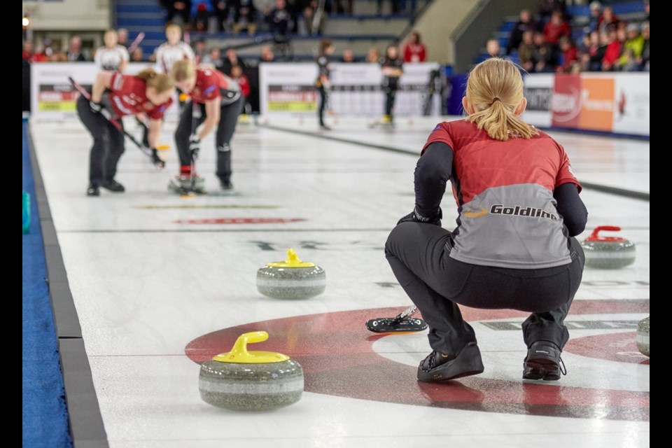 Isabella Wrana, skip for Team Wrana, waits for her team mates bring down the rock. Chelsea Carey and Isabella Wrana face off Friday morning in a win-or-go-home game after their B event losses.