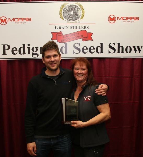 Mike Fedoruk of Fedoruk Seeds of Kamsack was presented with the award for Pedigreed Peas by Kathy Pearson at the 2018 Harvest Showdown.