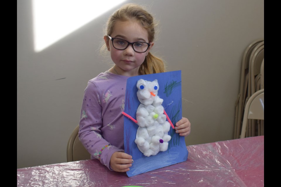 Grace Trepanier participated in a snowman craft at the Souris Valley Museum.