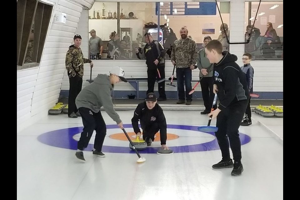 Having fun curling at the Sturgis Open bonspiel from left, were: Derek Ryczak, Chaz Jaeb, Skylar Ryczak, Jamie Lario, Colin Mastrachuk, Dwight Rubletz, Wyatt Mastrachuk and Avyn Seerey.