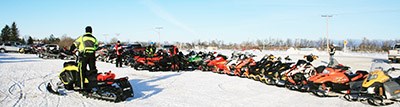 Sleds parked outside the Arcola Optimist Snowmobile Rally on Jan. 26.