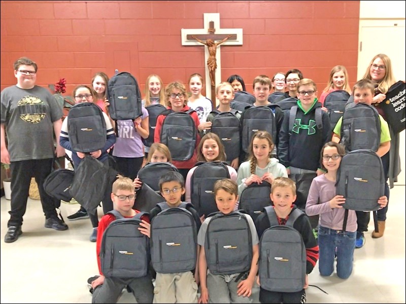 Hannah Kendrick’s Grade 6 class at St. Peter’s School in Unity took on their technology learning in a different way when they participated in a contest during Learning Code Week and earned an award, complete with prizes. Photos submitted by Sherri Solomko