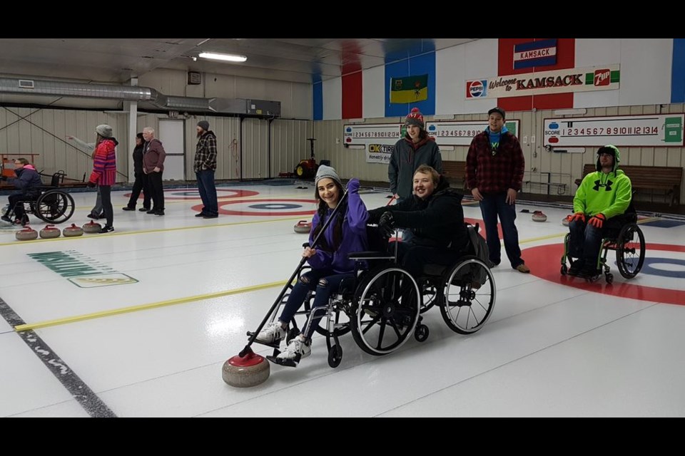 The Broda Sportsplex was the venue for the second annual Wheelchair Curling Funspiel held as a fundraiser on January 25 and 26. Taylor Geres of Langenburg, prepared to take her shot while Teddy Hudye held her chair. The foursome was rounded out by Josh Gogol of Canora (in wheelchair wearing green hoodie,) and Kyle Merceau of Langenburg (unavailable for the photo.)