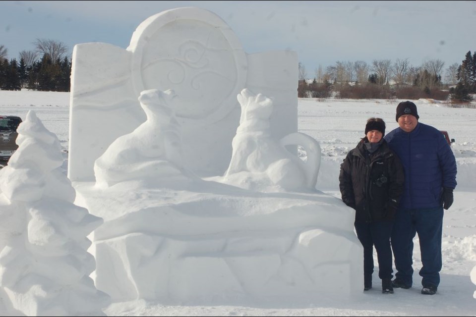 World renowned snow sculptor Theressa Wright, left, and her husband Terry Ouellette, both of Saskatoon created a snow sculpture for the Mushers’ Rendezvous 20th anniversary on February 2 and 3.