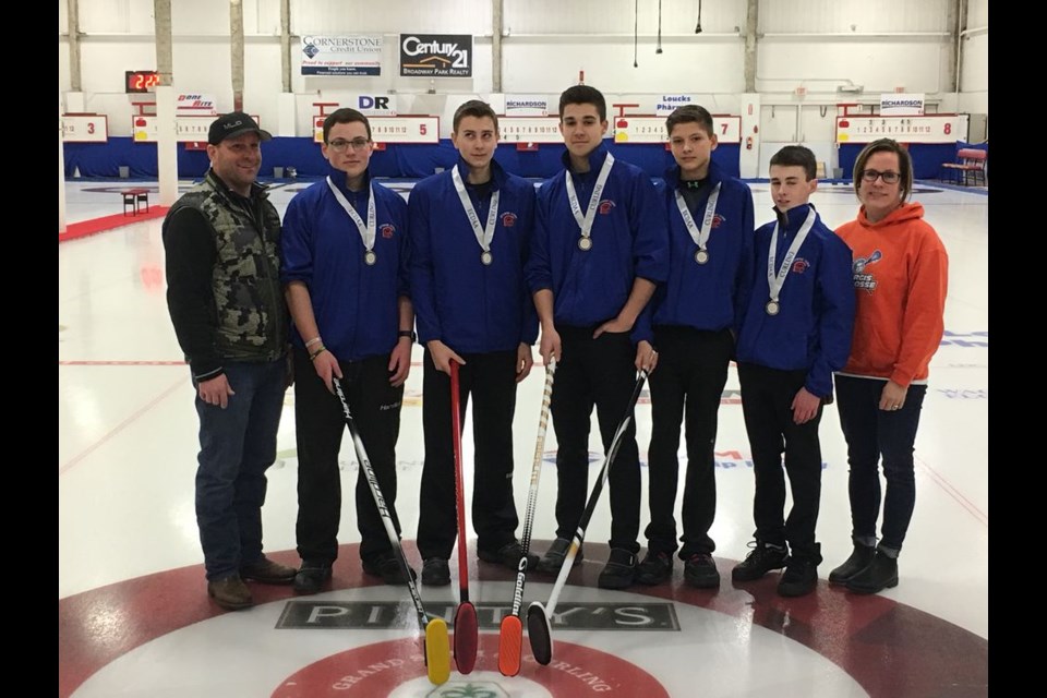 The Sturgis Composite School boys curling team won gold medals at the East Central District Athletic Association curling in Yorkton on February 8 and 9. From left, were: Cory Babiuk (coach); Shae Peterson (skip); Garrett Baziuk (third); Carter Masley (second); Daniell Mirva (lead), Camron Secundiak (lead) and Kristen Peterson, coach.