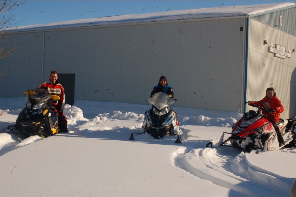 Local snowmobilers who enjoyed attended the Okla Snowmobile Derby on February 22 from left, were: Brandon Alberts and Kal Schutte, both of Okla and Zander Neitling of Preeceville.