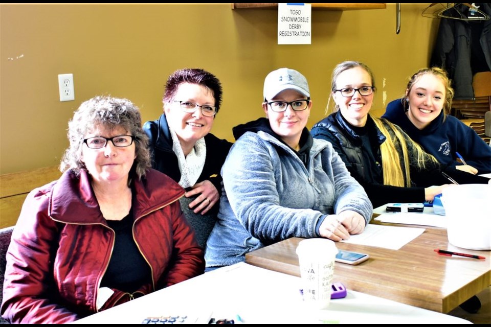 At work taking registrations for the Togo snowmobile derby last week, from left, were: Donna Airriess, Connie Barrowman, Tiffany Stone, Loretta Erhardt (Togo mayor) and Kate Erhardt.