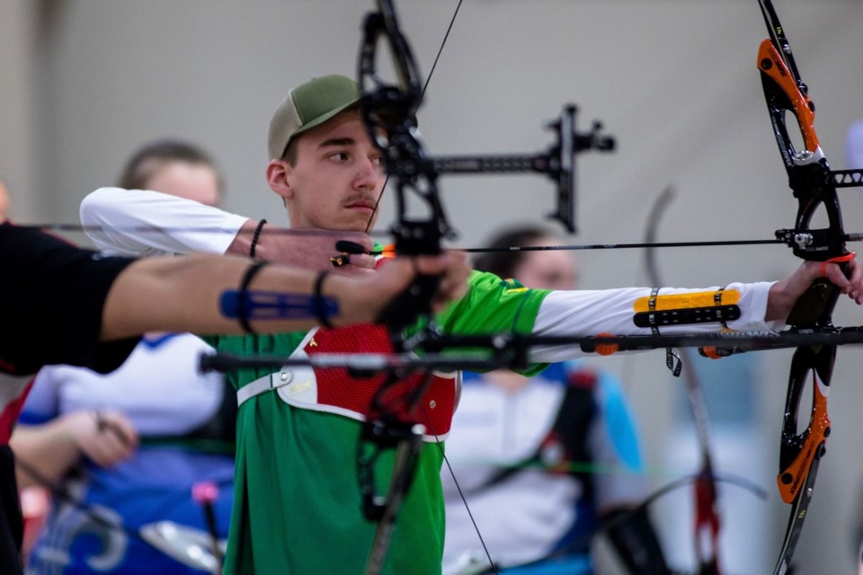 Hunter Chipley takes aim during one of the archery competitions. Photo by Jody Bailey with Team Sask.
