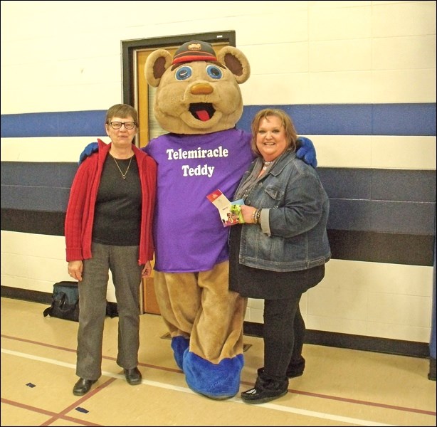Telemiracle Teddy with Linda Yuskiw and Angelena Lukan, staff at Borden School. Photos submitted by Lorraine Olinyk