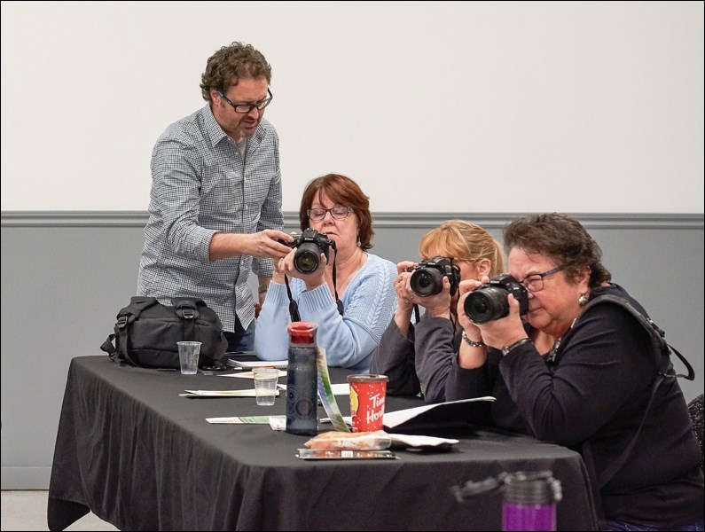 Tornado hunter Greg Johnson teaching photographers in North Battleford how to get the best out of their equipment by understanding what it does. He was teaching at the Western Development Thursday and Friday.