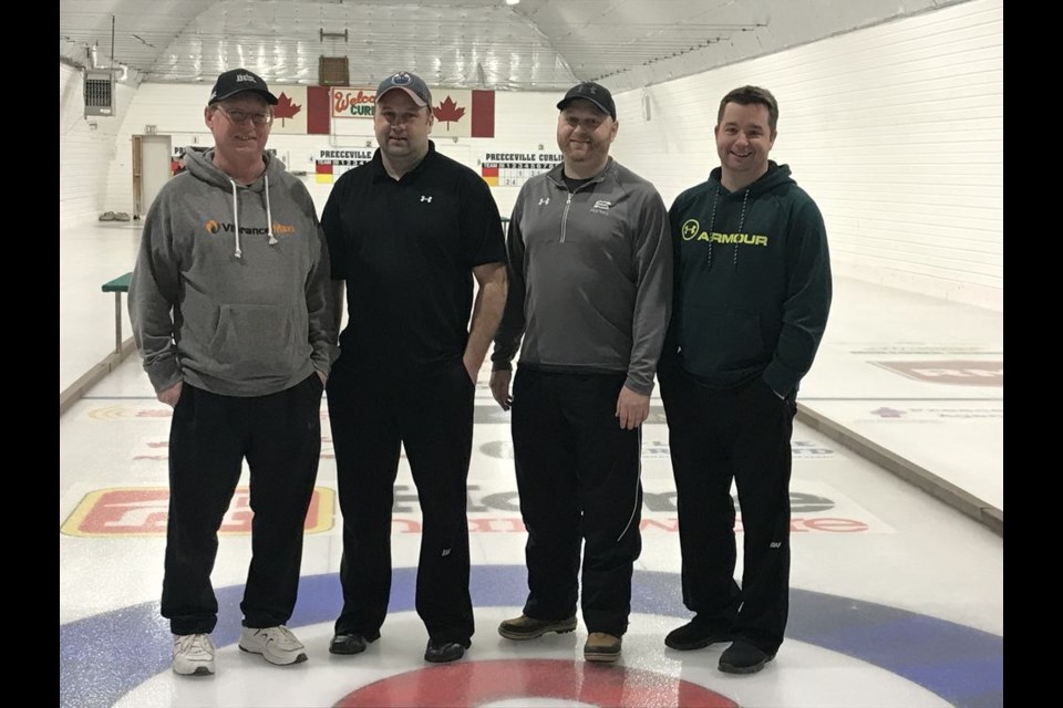 The Bob Kolodziejski team of Canora won the first event of the Preeceville Open bonspiel, held from February 25 to March 2. From left, were: Kolodziejski, John Zbitniff, Aaron Herriges and Terry Wilson.