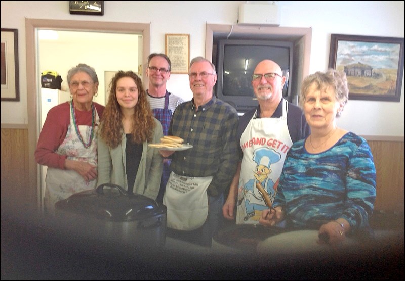 A pancake and sausage supper was held at the Do Drop In on March 5. Pictured are the workers – Maure