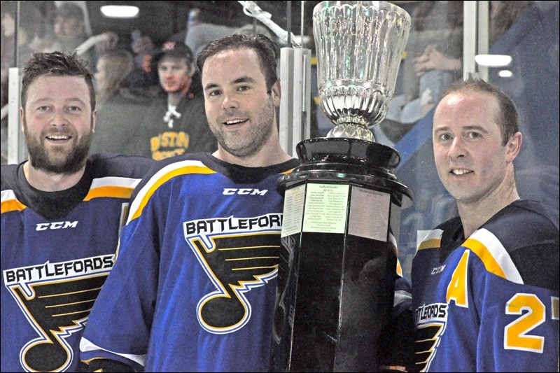 This was the scene at the Battleford Arena after the overtime goal by Mike George to win the SPHL title for the Battleford Beaver Blues. Photos by John Cairns