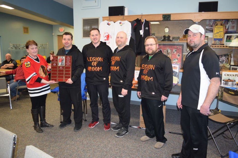 Del Palagian presented the “Legion of Broom” foursome of Canora with the Ted Palagian memorial plaque for winning the A event of the Canora men’s bonspiel, held from March 6 to 10. From left, were: Palagian, Terry Wilson (skip), Curtis Baillie (third), Aaron Herriges (second), Nolan Kondratoff (lead) and John Zbitniff (Canora Curling Club.)