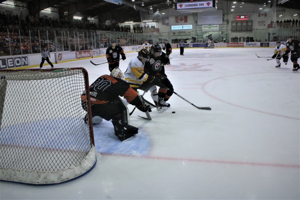 Ryan Ouellette makes a save.