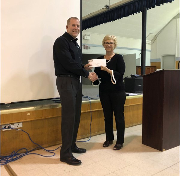 Unity Credit Union Manager Gerald Hauta accepted his 35 year milestone service award from board pres