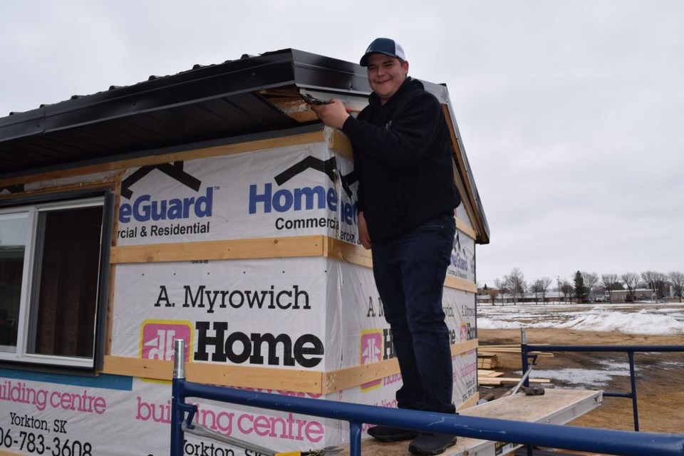 Josh Kitzan, Grade 10 student at Canora Composite School, was busy on March 27 with his tin snips, working on a storage shed project.