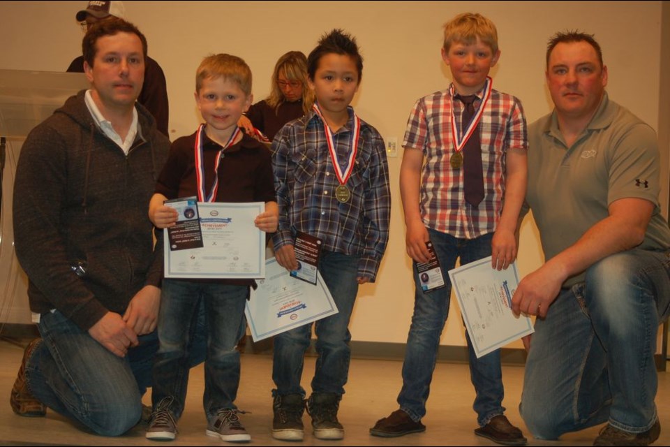 IP team members acknowledged during the Preeceville Pats hockey supper awards night, from left, were: Riley Erickson (coach), Landon Erickson (sportsmanship); Tanner Townsend (most improved); Dillon Serdachny (most dedicated) and Dean Serdachny (coach.)