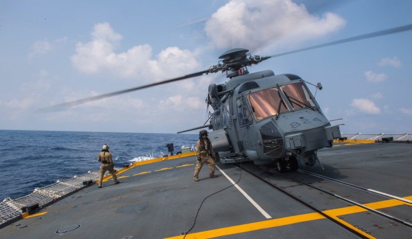 HMCS REGINA's Air Detachment trains on vertical replenishment and hoisting with the CH-148 helicopter BRONCO during Operation PROJECTON in the Pacific Ocean on March 14 2019.