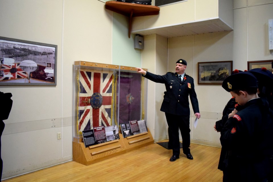 Dedication of the 152nd Battalion colours at the Estevan Legion Hall by Captain Craig Bird.