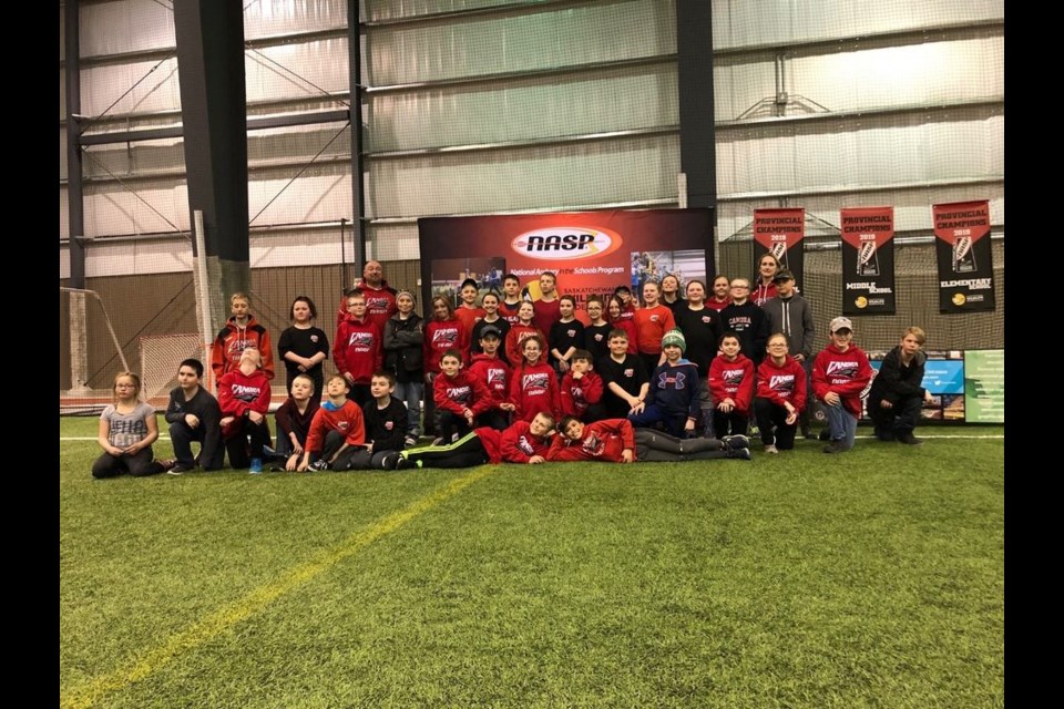 Grades 4 and 5 students and their coaches from CJES (Canora Junior Elementary School) and CCS (Canora Composite School) who took part in the elementary portion of the NASP (National Archery in the Schools Program) provincials on March 30, from left, were: (back row) Andrew Sliva, Storey Fehr, Jacob Lowes, Rod Steciuk (coach), Ferlyn Brass, Jhett Kelly, Kale Strelioff, Danielle Dutchak, Cooper Kraynick, Paisley Wolkowski, Henry Craig, Kaelyn Shukin, Rhianna Stefanyshyn, Heidi Mentanko, Gaspar Thomas, Meekah Unick, Miah Ruf, Heidi Parmley, Natalie Kosar, Addison Burym, Jennifer Prychak (Coach) and Tyrrique Lemaigre; (middle) River Crane, Teagan Jones, Cayden Kelly, Mason Cutforth, Jordan Insko, Damian Woolman, Jordan Zbitniff, Owen Ostafie, Natalie St. Mars, Brayden Fediuk, Chase Curtis, Jackson Palagian, Matthew Knox, Merrick Dutchak, Lane Smith and Braidyn Nesbitt, and (front) Josh Prychak and Liam Trask. Jordan Makowsky was unavailable for the photo.