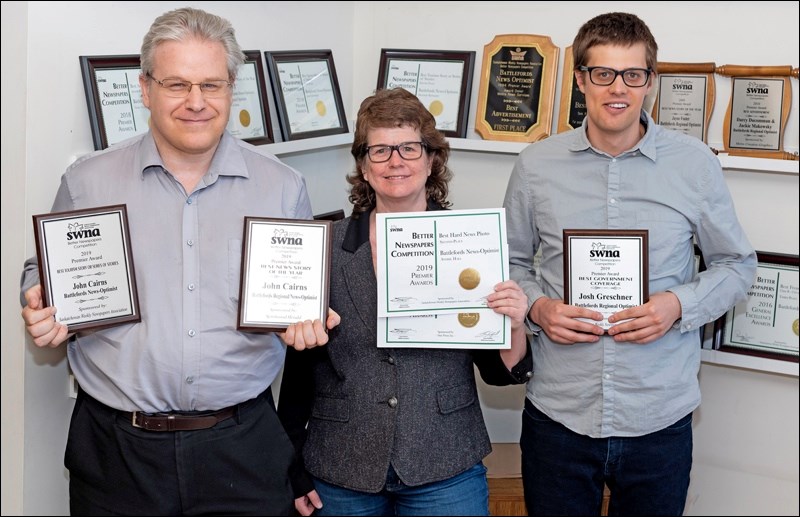 John Cairns, Averil Hall and Josh Greschner with their awards from the Saskatchewan Weekly Newspapers Association.