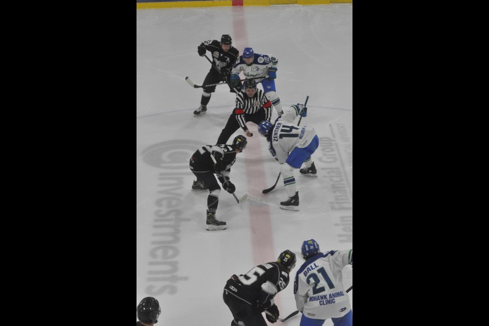 Opening faceoff of game one, North Stars and Melfort.