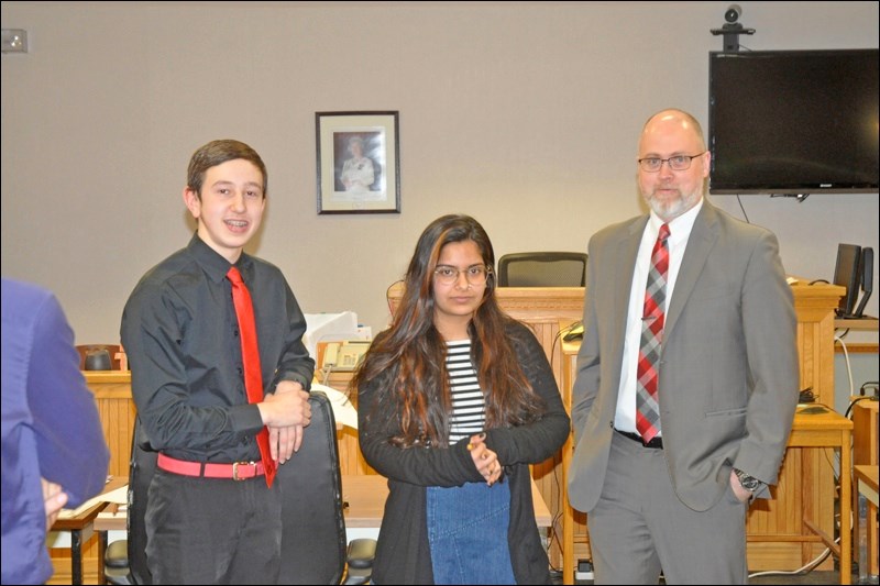 Prosecutors Dante Bacchetto, Ishita Mann and Lee Hnatiuk.