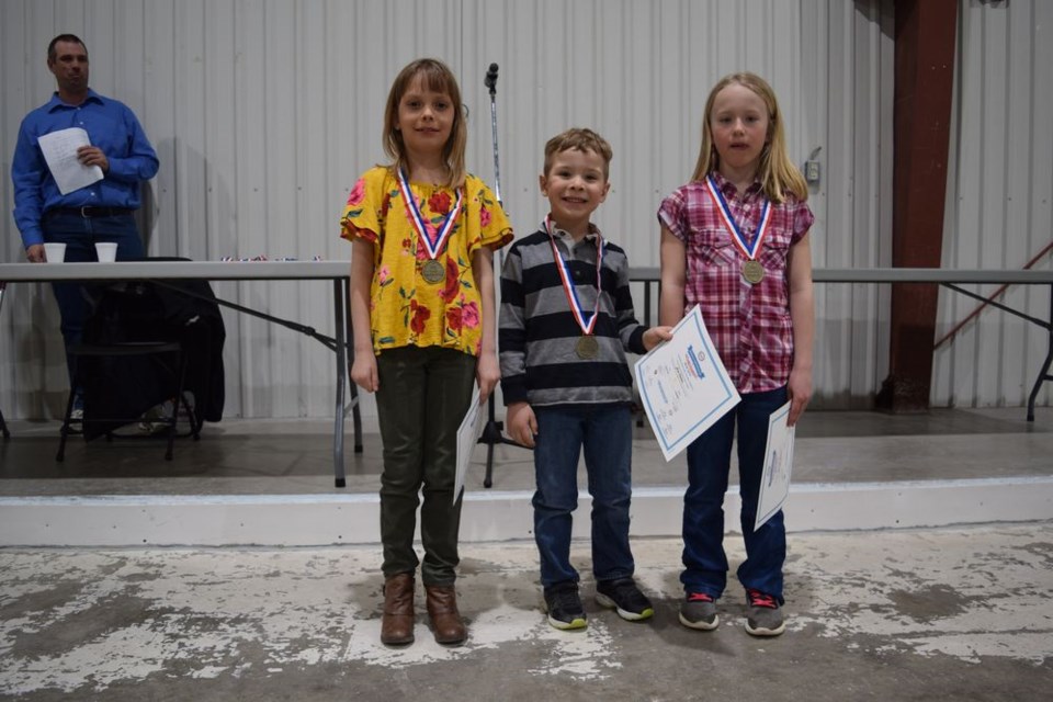 For the IP team, from left: Hailey Kraynick won the most sportsmanlike player award; Drew Kitchen, the most dedicated player, and Courtlyn Heshka, the most improved.