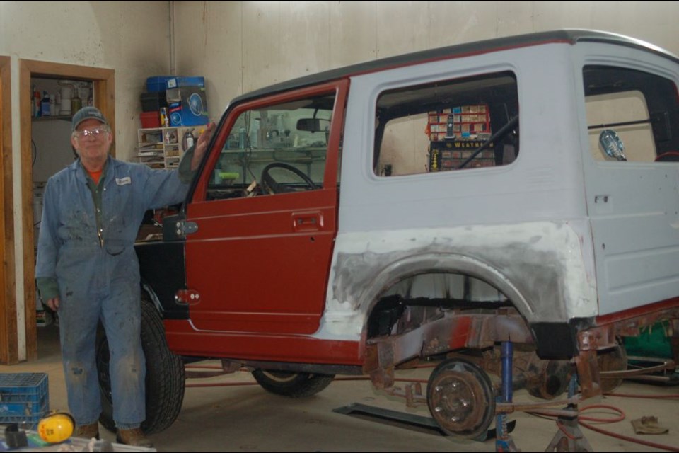Now that Norman Johnson has retired and closed his business previously known as Ketchen Auto Body he has time to work on his own personal projects that were never completed. He was photographed with his 1985 Suzuki Samurai.