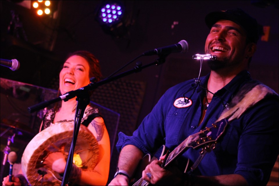 Chelsey June and Jaaji with the group Twin Flames strut their stuff during a concert at Johnny’s Social Club April 15, organized by the Flin Flon Youth Arts Council. Twin Flames brought songs involving Indigenous culture and tradition to the Johnny’s crowd, including an Aboriginal-infused cover version of the Tragically Hip classic “Grace, Too.” - PHOTO BY ERIC WESTHAVER