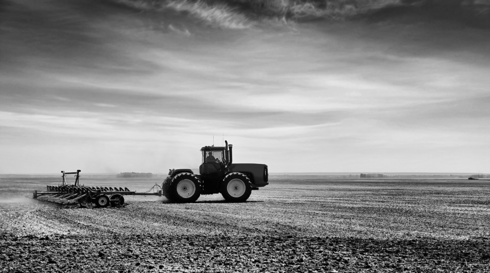 tractor with attached cultivator