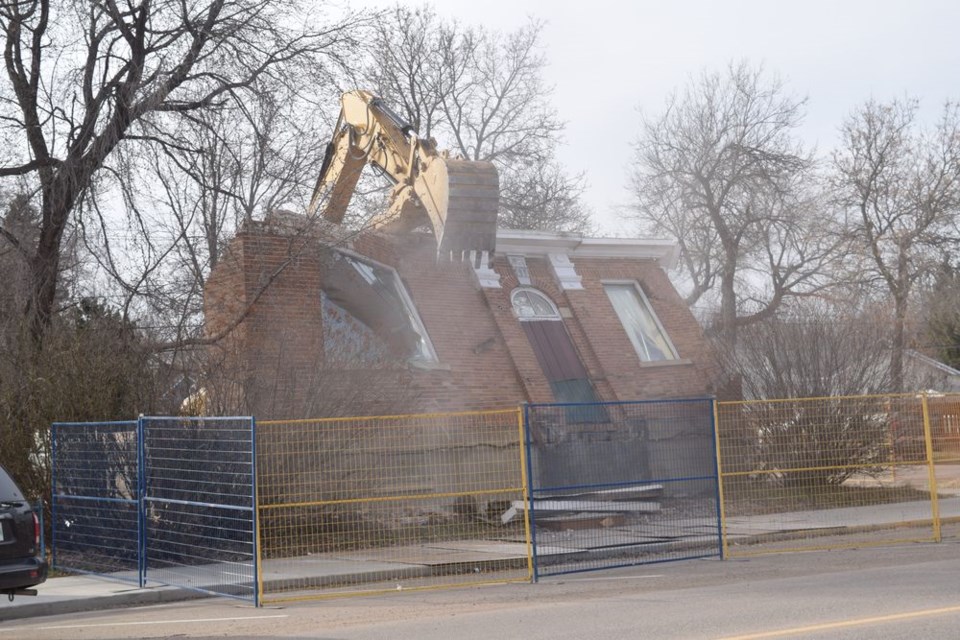 The tearing down of the east wall facing Main Street marked the completion of the demolition of the RM of Good Lake building on April 25 by Wyonzek Brothers Construction.